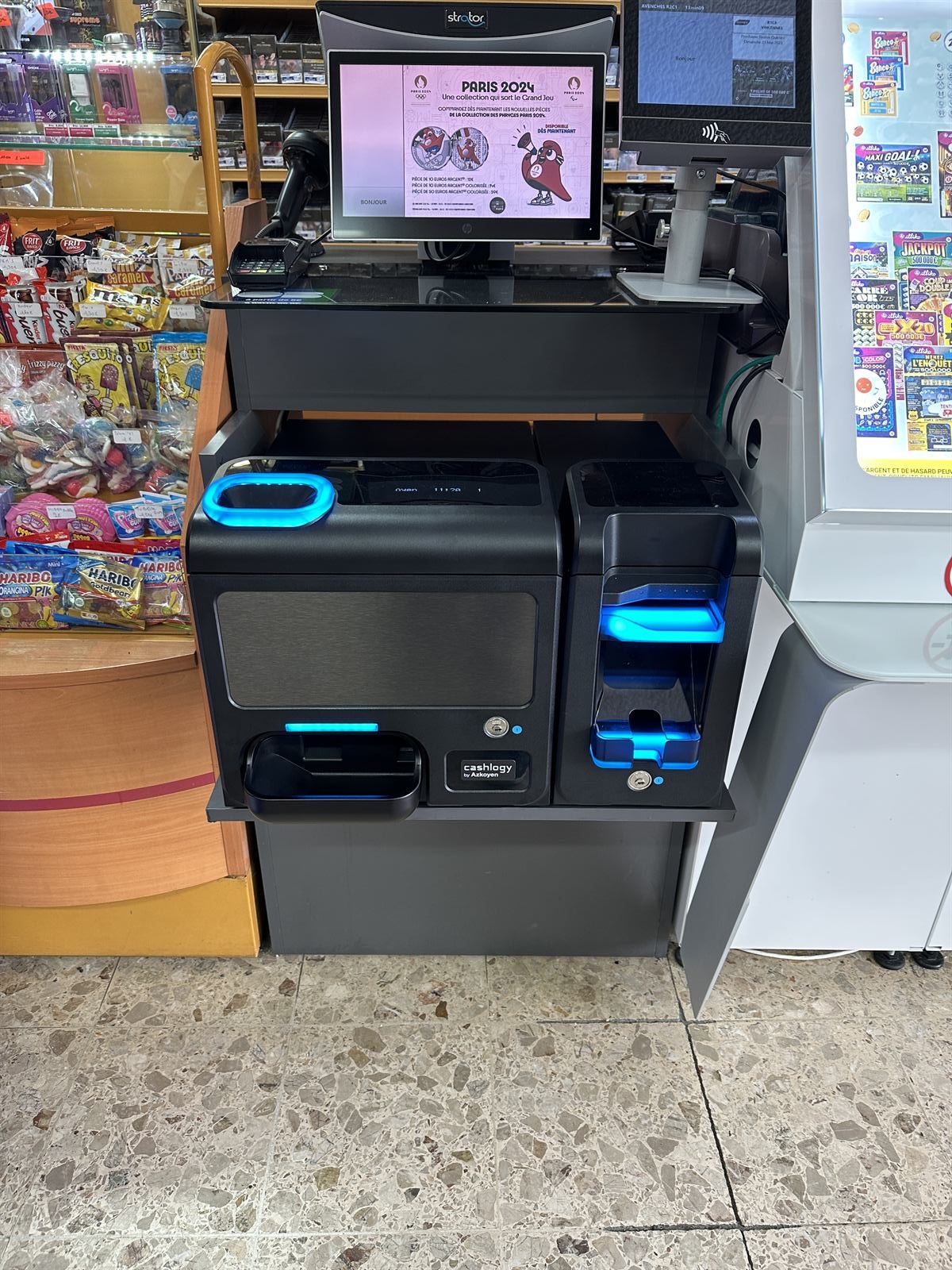 Installation monnayeur automatique Cashlogy dans un bureau de tabac