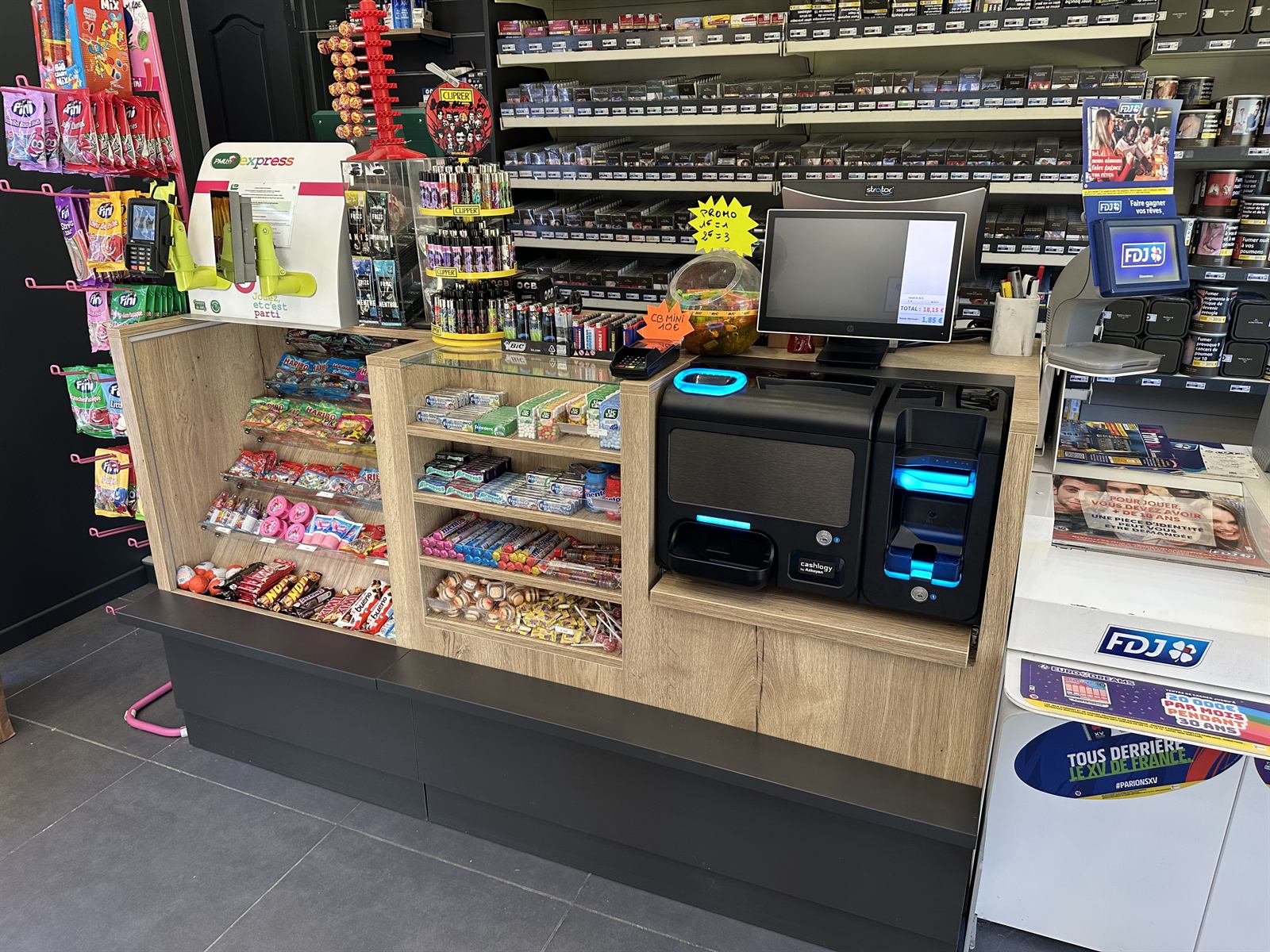 Installation monnayeur automatique Cashlogy dans un commerce